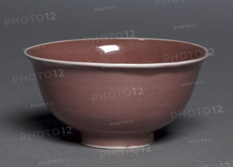 Bowl with Dragons and Clouds, 1368-1398. China, Jiangxi province, Jingdezhen, Ming dynasty (1368-1644), Hongwu period (1368-98). Porcelain with molded and incised decoration and copper-red glaze; diameter: 10 cm (3 15/16 in.); overall: 5 cm (1 15/16 in.).