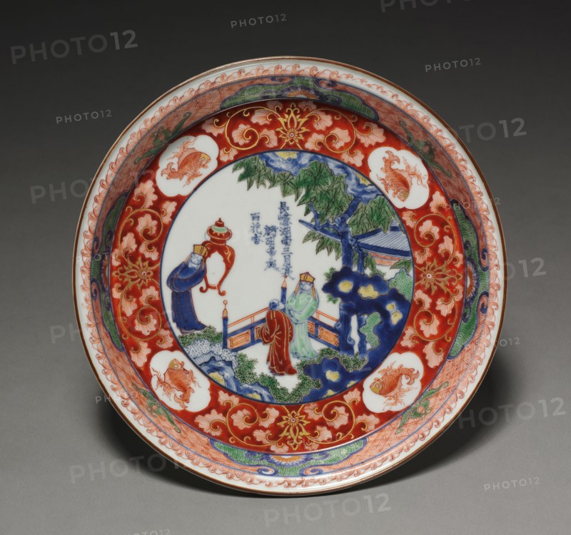 Dish with Chinese Figures in a Garden, 1700s. Japan, Edo Period (1615-1868). Imari ware porcelain with underglaze blue and overglaze enamel and gold decoration; diameter: 21 cm (8 1/4 in.); height: 3.2 cm (1 1/4 in.).
