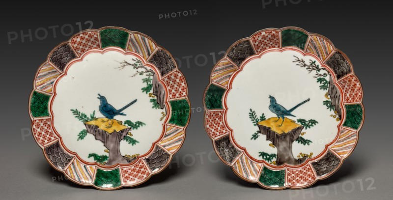 Pair of Dishes with Singing Bird on a Rock: In Ko Kutani Style, 18th century. Japan, Edo Period (1615-1868). Porcelain with underglaze blue and overglaze enamel decoration; diameter: 20.8 cm (8 3/16 in.); overall: 3.3 cm (1 5/16 in.).