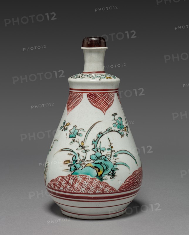 Wine Bottle with Plum and Pine Tree Design: Ko Imari Type, late 17th century. Japan, Edo Period (1615-1868). Porcelain with underglaze enamel decoration; diameter: 14.2 cm (5 9/16 in.); overall: 24.2 cm (9 1/2 in.).