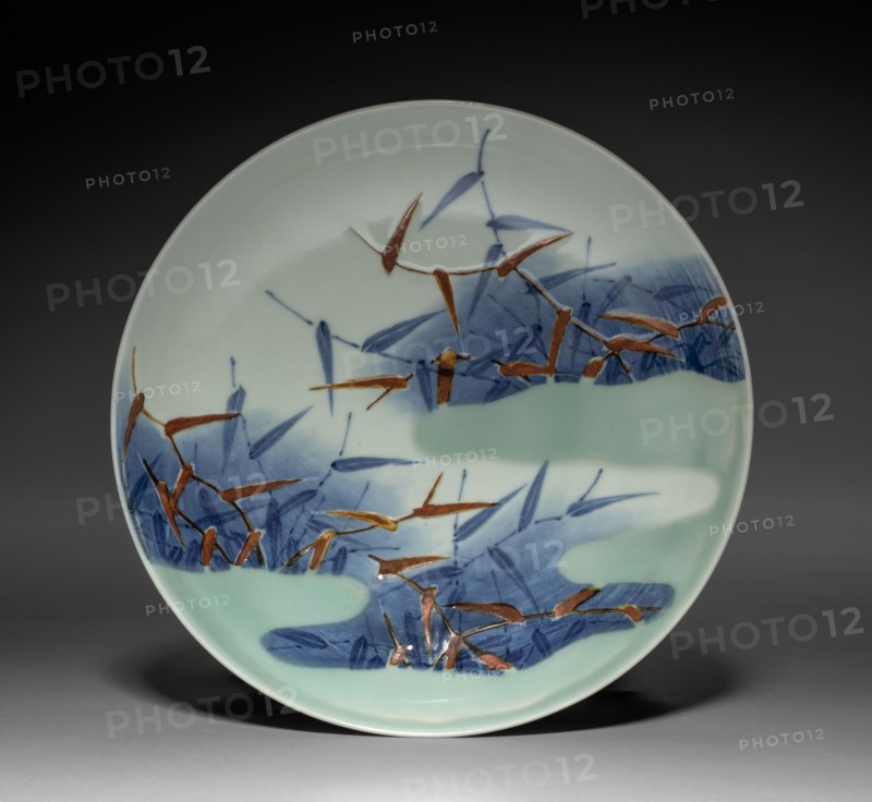 Dish with Reeds and Mist, c. 1700. Japan, Edo Period (1615-1868). Porcelain with underglaze blue and overglaze color enamels (Nabeshima ware); diameter: 20.1 cm (7 15/16 in.); overall: 5.6 cm (2 3/16 in.).
