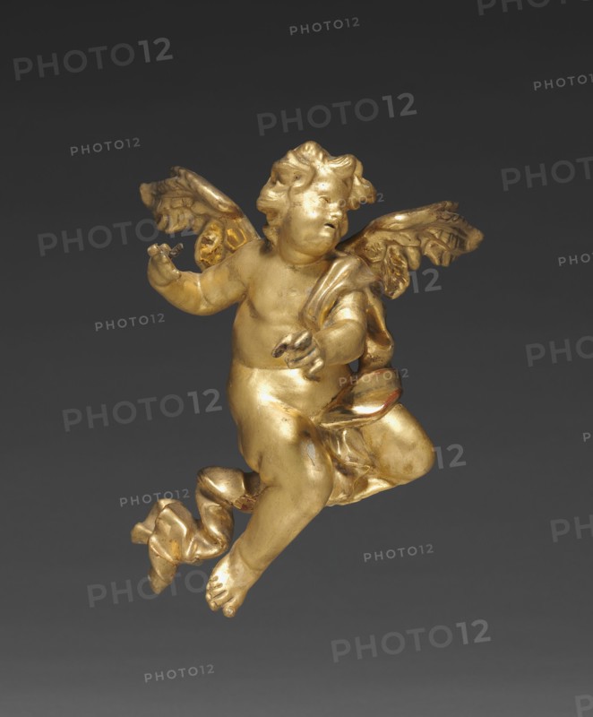 Altarpiece with Relics - Putto, middle left, c. 1735-1740. And workshop Joseph Matthias Götz (German, 1696-1760). Gilded wood, with relics in niches: gilded wood, mother-of-pearl, ebony, red silk, gold wire, seed pearls, rock crystal, pen and ink on paper