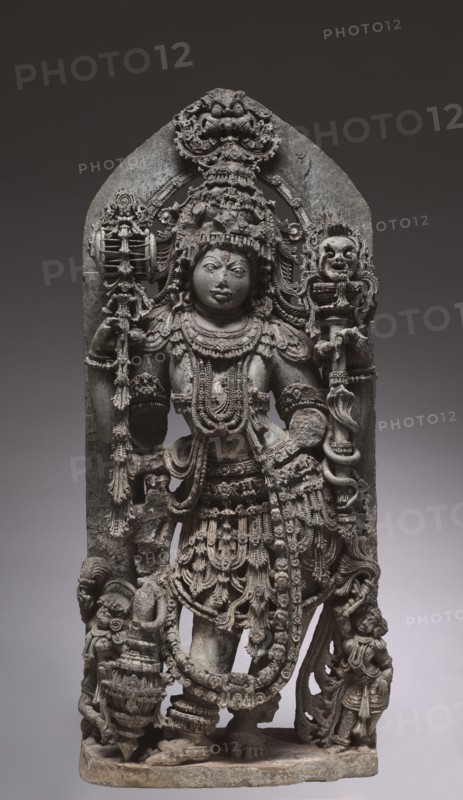 A Guardian of Shiva, 1200s. Southwestern India, Karnataka. Chloritic schist; overall: 113.3 x 49.2 x 29 cm (44 5/8 x 19 3/8 x 11 7/16 in.).