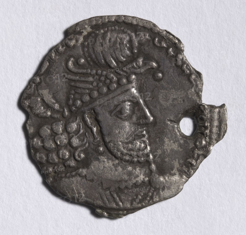 Drachma: Head of Hormizd II (obverse), 303-310. Iran, Sasanian, Reign of Hormizd II, 4th century. Silver; diameter: 2.3 cm (7/8 in.).