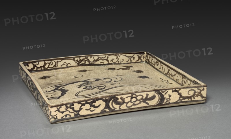 Square Dish with Design of Plovers over Waves, c. 1700. Ogata Korin (Japanese, 1658-1716), Ogata Kenzan (Japanese, 1663-1743). Kyoto ware; glazed earthenware with iron brown underglaze; overall: 22 x 22 x 2.7 cm (8 11/16 x 8 11/16 x 1 1/16 in.).