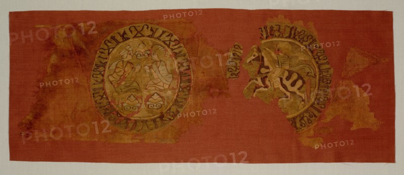 Celestial banquet hanging, from the tomb of Bishop Gurb, 1200-1284. Spain, probably Almeria. Plain weave with inwoven tapestry weave: silk and gold thread; overall: 21.2 x 58.5 cm (8 3/8 x 23 1/16 in.)