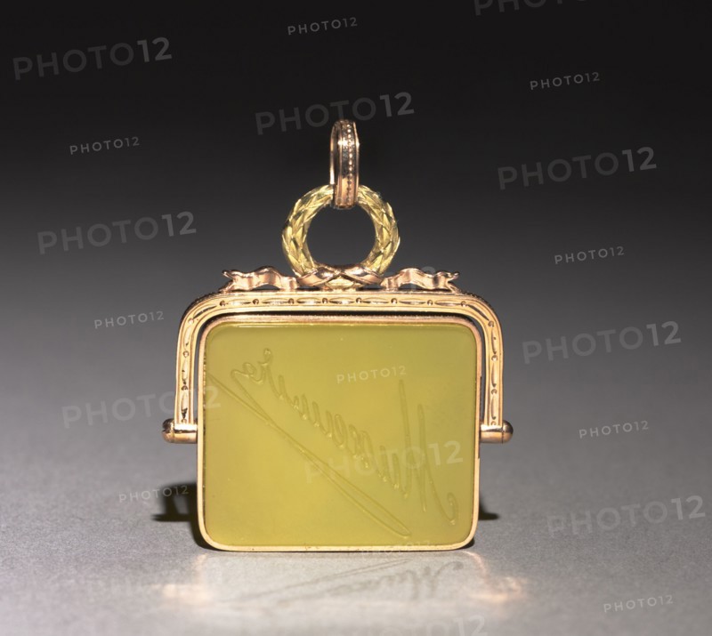 Swivel Seal, before 1896. Firm of Peter Carl Fabergé (Russian, 1846-1920), Mikhail Evlampievich Perkhin (Russian, 1860-1903). Gold mounts, yellow stone (or glass); overall: 4.4 x 3.5 cm (1 3/4 x 1 3/8 in.).