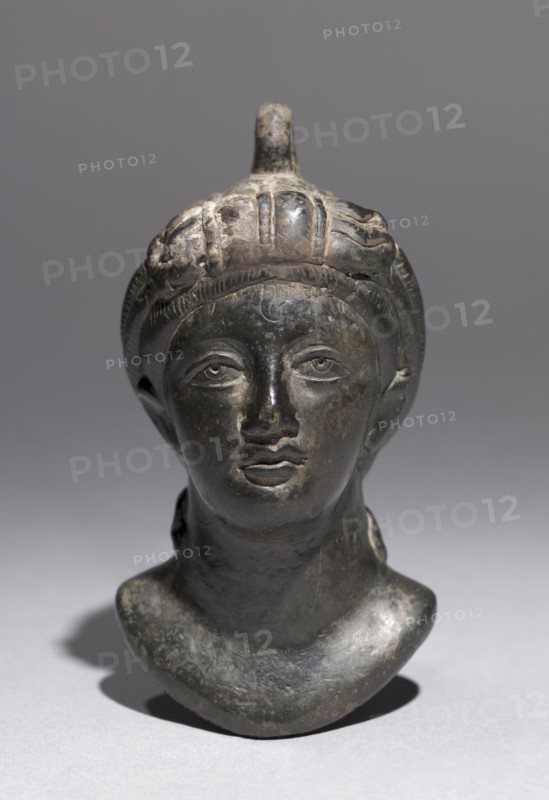 Balance Weight formed as the Bust of an Empress, c. 390-400. Byzantium, Theodosian period, 4th century. Bronze; overall: 10.1 x 5.4 x 5.6 cm (4 x 2 1/8 x 2 3/16 in.)