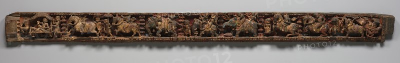 Narrative Frieze:  Procession with Dignitary in a Palanquin Architrave from a Jain Temple, 1500s-1600s. India, Gujarat, 16th-17th century. Wood with traces of color; overall: 20.4 x 257.7 x 10.2 cm (8 1/16 x 101 7/16 x 4 in.).