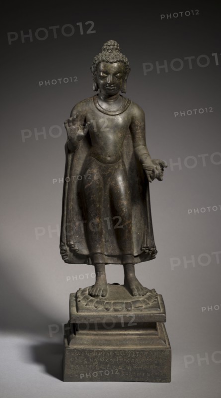 Standing Buddha, 591. Northeastern India or Nepal, Gupta/Licchavi period. Bronze; overall: 46.5 x 15.4 x 13.4 cm (18 5/16 x 6 1/16 x 5 1/4 in.); without base: 35 x 13.8 x 10.5 cm (13 3/4 x 5 7/16 x 4 1/8 in.).