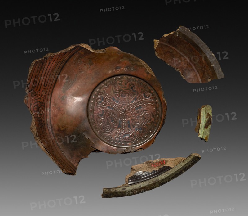 Fragments of a Lacquer Tray, 9 AD. China, excavated at Lolang, Xin dynasty (9-23). Lacquer; part 1: 3.6 x 18.1 cm (1 7/16 x 7 1/8 in.); part 2: 3.8 x 14.3 cm (1 1/2 x 5 5/8 in.); part 3: 5.5 x 10.7 cm (2 3/16 x 4 3/16 in.); part 4: 1.6 x 5.1 cm (5/8 x 2 in.).
