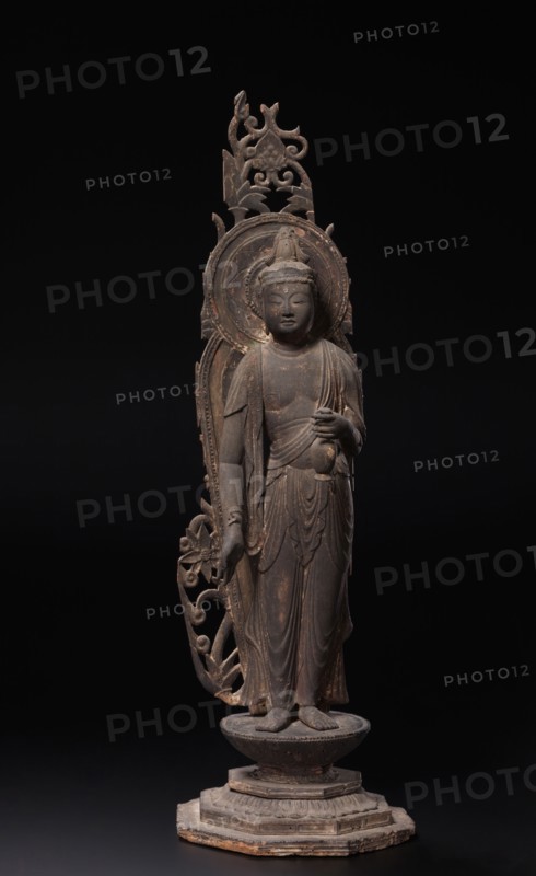 Miroku: Future Buddha, 12th century. Japan, Heian Period (794-1185). Wood; overall: 51.2 cm (20 3/16 in.); pedestal: 11 cm (4 5/16 in.).
