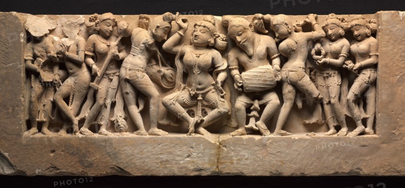 Frieze with Dancer and Musicians, c. 973. Northwestern India, Rajasthan, Sikar, Harshagiri, 10th century. Sandstone; overall: 33.4 x 95.3 x 11.3 cm (13 1/8 x 37 1/2 x 4 7/16 in.).