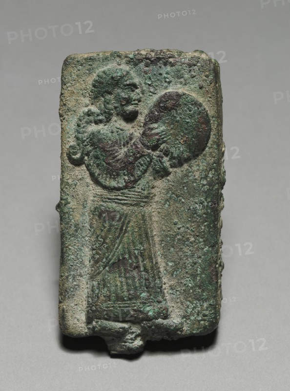 Hand Drummer, 900-700 BC. Assyrian, Iraq or possibly Syria, 9th-7th Century BC. Bronze, solid cast; overall: 7.3 x 3.8 cm (2 7/8 x 1 1/2 in.).
