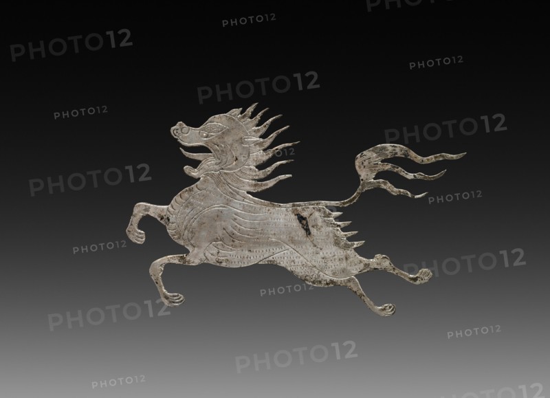 Inlay for a Mirror or Box: shih-shih, c. 900-1000. China, Tang dynasty (618-907) - Song dynasty (960-1279). Beaten silver with chased details; overall: 4.2 x 6.1 cm (1 5/8 x 2 3/8 in.).