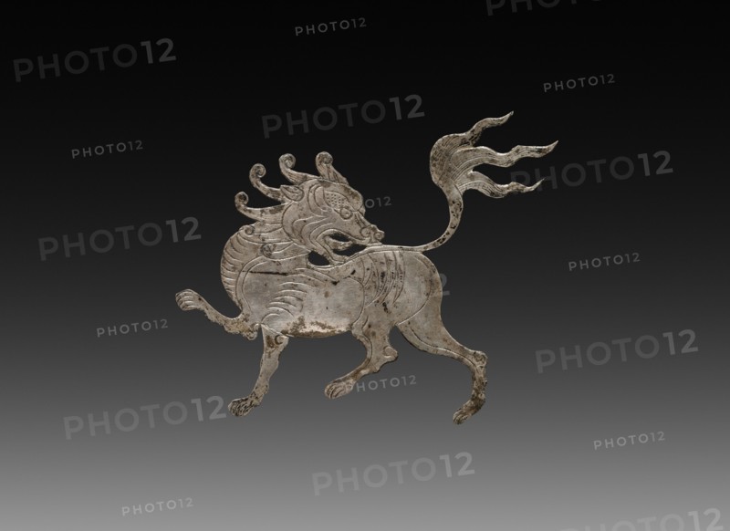 Inlay for a Mirror or Box: shih-shih, c. 900-1000. China, Tang dynasty (618-907) - Song dynasty (960-1279). Beaten silver with chased details; overall: 4.6 x 5.2 cm (1 13/16 x 2 1/16 in.).