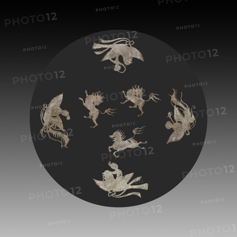 Inlays for a Mirror or Box, c. 900-1000. China, Tang dynasty (618-907) - Song dynasty (960-1279). Beaten silver with chased details; overall: 4.7 x 8.4 cm (1 7/8 x 3 5/16 in.); irregular: 5.3 x 8.4 cm (2 1/16 x 3 5/16 in.); part 1: 4.6 x 8.4 cm (1 13/16 x 3 5/16 in.); part 2: 5.2 x 7.8 cm (2 1/16 x 3 1/16 in.); part 3: 5.2 x 5.6 cm (2 1/16 x 2 3/16 in.); part 4: 4.2 x 6.1 cm (1 5/8 x 2 3/8 in.); part 5: 4.6 x 5.2 cm (1 13/16 x 2 1/16 in.).