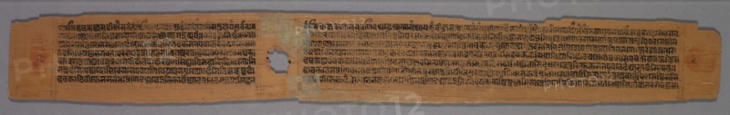Leaf from a Jain Manuscript: page from a Great Poem about Twos (Dvyashraya Mahakavya) of Hemachandra, with commentary by Abhayatilaka: Text (recto), after 1255. Abhayatilakagani (Indian). Opaque watercolor and ink on palm leaf; overall: 5.7 x 45.7 cm (2 1/4 x 18 in.).