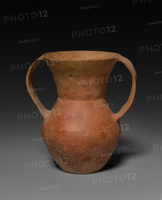 Double-Handled Beaker, c. 2000-1500 BC. China, type-site at Qijiaping, Gansu province, Neolithic period, Qijia Culture. Burnished earthenware;