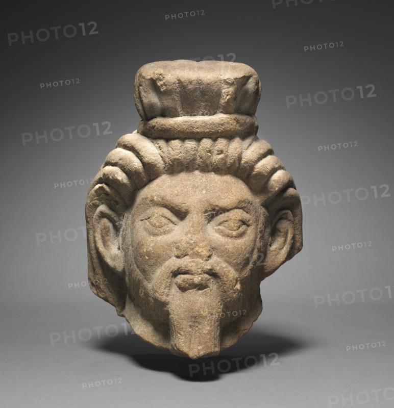 Head of a Rishi, c. 125-150. Northern India, Mathura, Kushan period (c. 80-320). Stone; overall: 27.7 x 24 cm (10 7/8 x 9 7/16 in.).