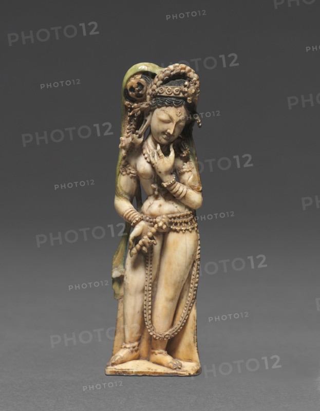 Female Attendant Bearing a Lotus , 8th Century. India, Kashmir, 8th century. Ivory; overall: 7.2 x 2.3 x 1.1 cm (2 13/16 x 7/8 x 7/16 in.); base: 2.2 x 2.3 cm (7/8 x 7/8 in.).