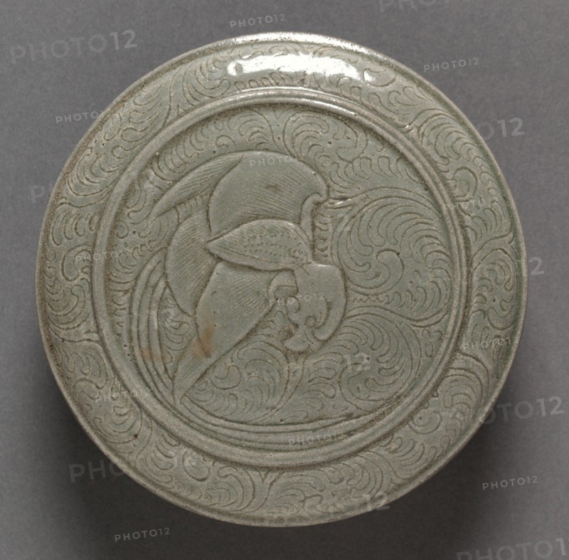 Covered Box: Yue Ware (lid), 907-960. China, Shang-lin-hu kilns, Yu-yao District, Zhejiang province, Five dynasties (907-960). Glazed stoneware with incised decoration; diameter: 13 cm (5 1/8 in.).