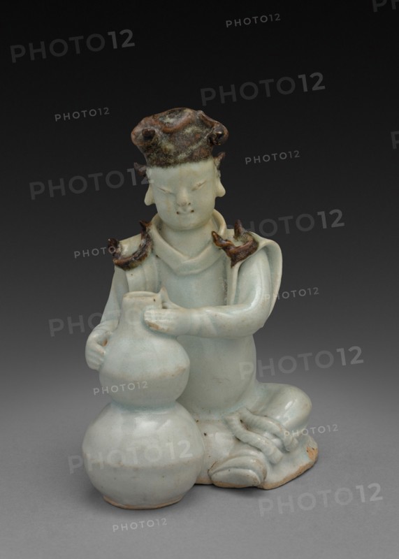 Potter Seated with Double Gourd Vase:  Ch'ing-pai Ware, 14th Century. China, Yuan dynasty (1271-1368) - Ming dynasty (1368-1644). Porcelain with underglaze decoration; overall: 13.5 cm (5 5/16 in.).