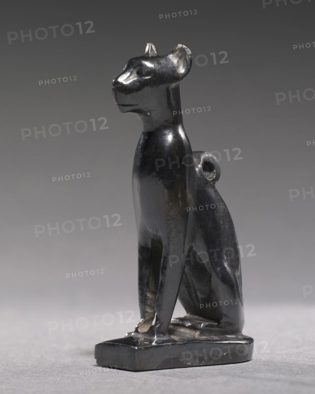 Amulet of Bastet, c. 1069-715 BC. Egypt, Third Intermediate Period. Hematite; overall: 4.4 x 1.1 x 2.8 cm (1 3/4 x 7/16 x 1 1/8 in.).