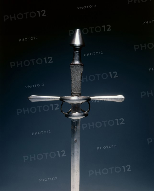 Hand-and-a-Half Sword, c.1540-1580. Germany, 16th century. Steel; wood, leather, sharkskin grip; overall: 116.8 cm (46 in.); blade: 94.8 cm (37 5/16 in.); quillions: 31 cm (12 3/16 in.); grip: 21 cm (8 1/4 in.).