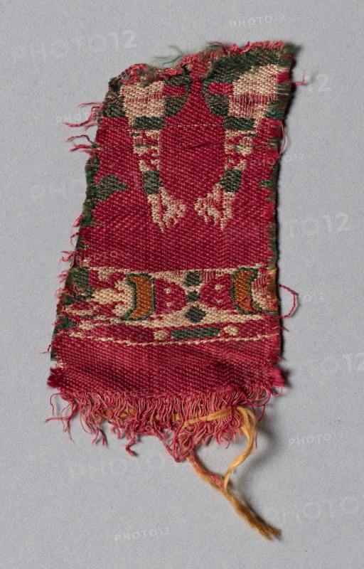 Silk Fragment:  David (or Samson) killing the Lion, 600s - 700s. Byzantium, 7th - 8th century. Compound twill weave, silk; overall: 8.6 x 4.8 cm (3 3/8 x 1 7/8 in.)