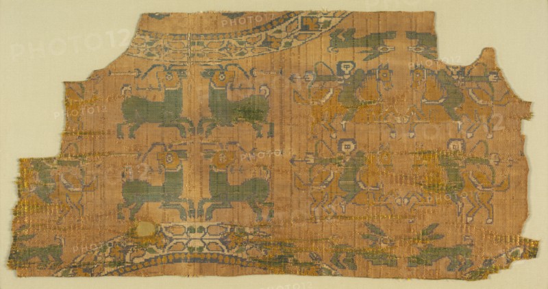 Samite fragment with hunters, 800s. Eastern Iran or Central Asia. Compound twill, silk; overall: 22 x 41.8 cm (8 11/16 x 16 7/16 in.)
