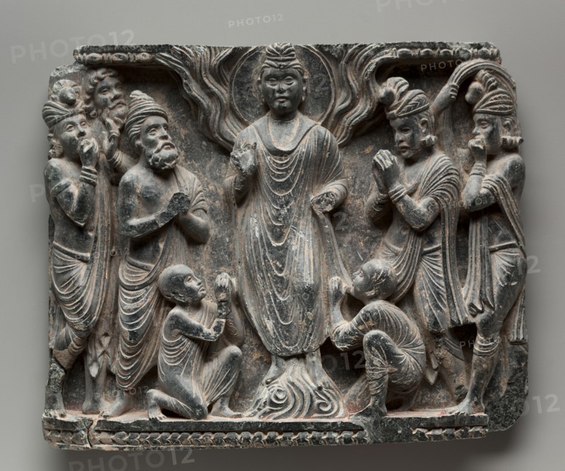 The Great Miracle at Shravasti, c. 100. Pakistan, Gandhara, Peshawar Valley, early Kushan Period (1st century-320). Schist with traces of gold; overall: 23.8 x 29.2 cm (9 3/8 x 11 1/2 in.).