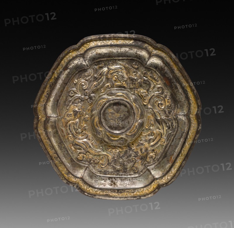 Cup Stand with Dragons amid Fungus Scrolls, 14th Century. China, Yuan dynasty (1271-1368). Silvered and gilt copper with repoussé design; diameter: 17.3 cm (6 13/16 in.).