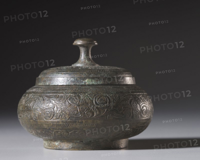 Reliquary Box, 200-400. Pakistan, Gandhara, probably Swat, late Kushan period (AD 1-320). Bronze; diameter: 8.6 cm (3 3/8 in.); overall: 7 cm (2 3/4 in.).