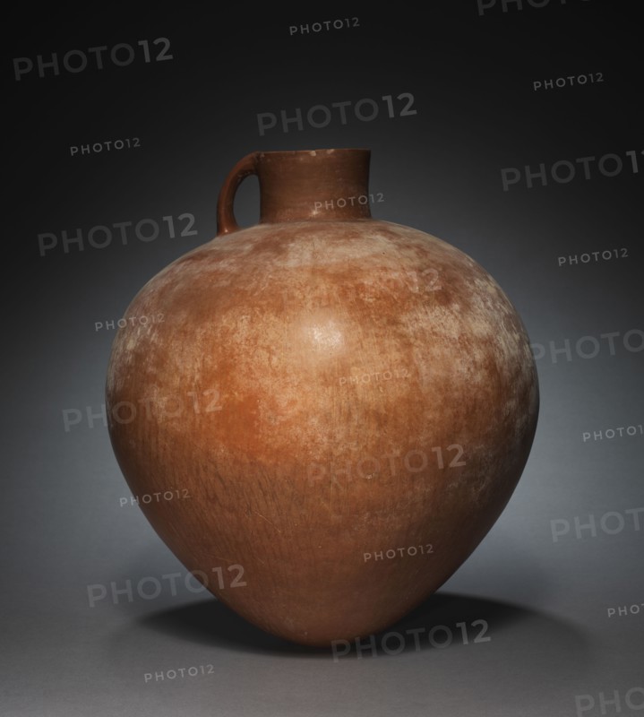 Red-Burnished Jug, 1000-700 BC. Iran, Amlash, 10th-8th century BC. Earthenware; diameter: 37.4 cm (14 3/4 in.); diameter of mouth: 10.3 cm (4 1/16 in.); overall: 45.4 cm (17 7/8 in.).