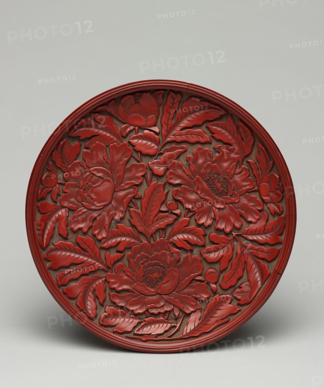 Plate with Peony Decoration, late 1300s-early 1400s. China, Yuan dynasty (1271-1368). Carved cinnabar lacquer on wood; diameter: 16.5 cm (6 1/2 in.).