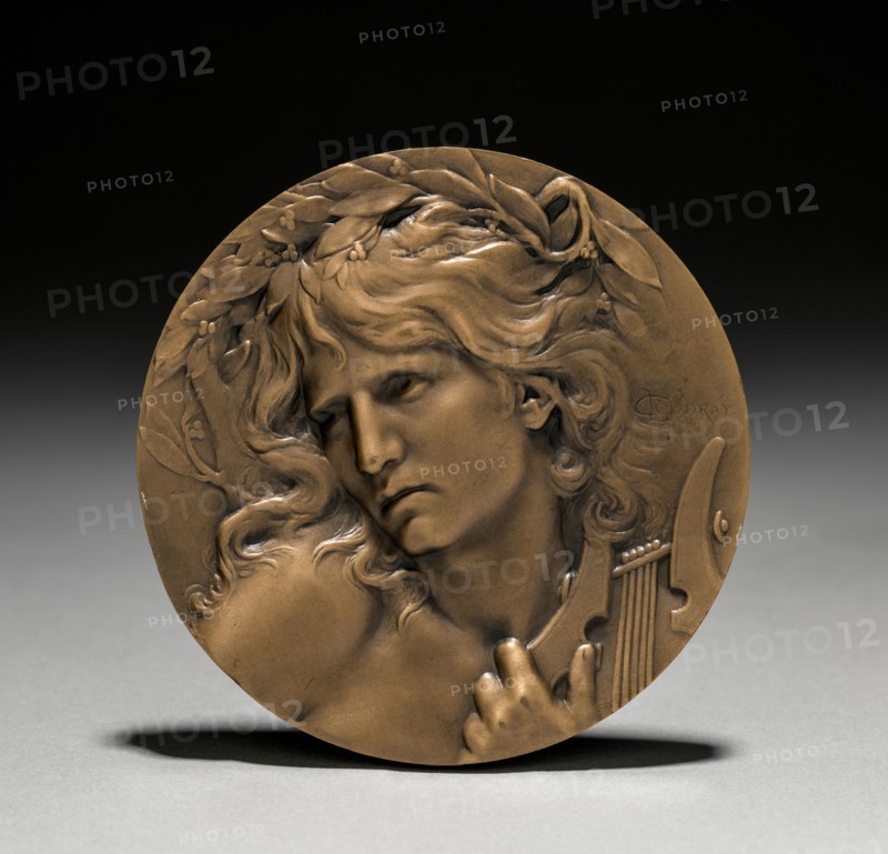 Medal Presented to Loïe Fuller by the French Government:  Orpheus at the Entrance to the Underworld (obverse). Marie Alexandre Lucien Coudray (French, 1864-1932). Bronze; diameter: 7 cm (2 3/4 in.).