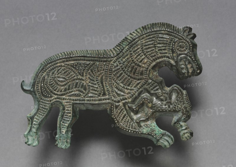 Wolf Attacking a Man, 400-300 BC. Thrace, 4th Century BC. Bronze; overall: 7 x 9.3 x 0.4 cm (2 3/4 x 3 11/16 x 3/16 in.).