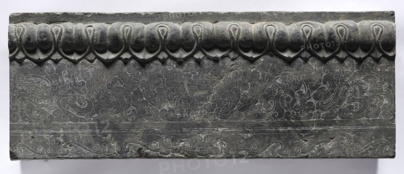 Section of a Coffin Platform: Horizontal Panel, 550-577. China, Northern Qi dynasty (550-577). Limestone; overall: 45.7 x 211.4 x 10.8 cm (18 x 83 1/4 x 4 1/4 in.); panel: 25.4 x 64.8 x 10.8 cm (10 x 25 1/2 x 4 1/4 in.).