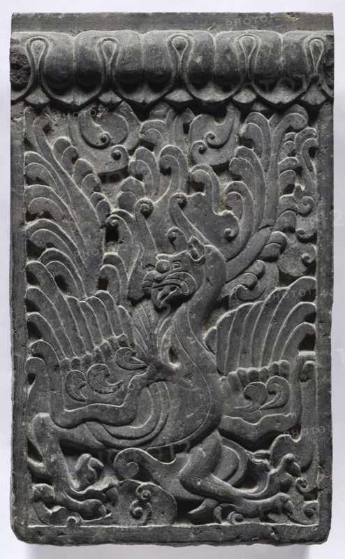 Section of a Coffin Platform: Phoenix, 550-577. China, Northern Qi dynasty (550-577). Limestone; overall: 45.7 x 211.4 x 10.8 cm (18 x 83 1/4 x 4 1/4 in.); panel: 45.7 x 27.6 x 10.8 cm (18 x 10 7/8 x 4 1/4 in.).