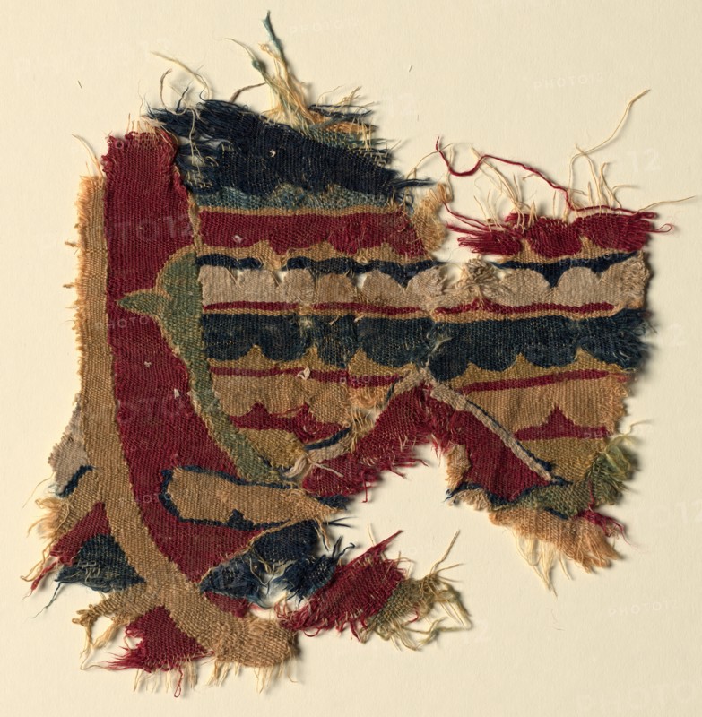 Fragment of a Large Hanging, 800s. Egypt, Tulunid period, 9th century. Tapestry weave: wool; overall: 29.2 x 29.5 cm (11 1/2 x 11 5/8 in.)