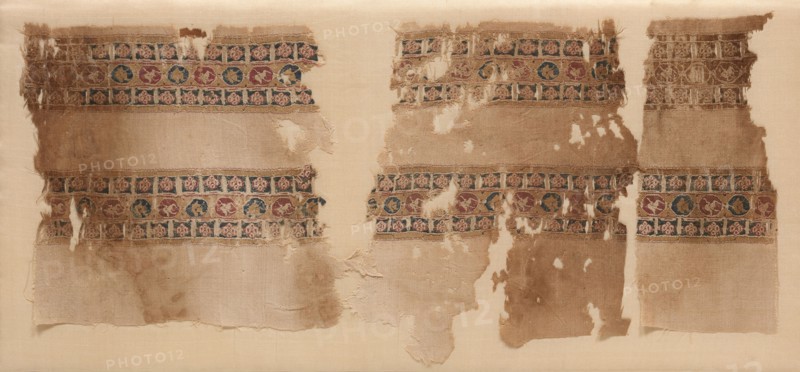 Fragment of Tiraz-Style Textile, 1100s. Egypt, Fatimid period, 12th century. Tabby ground with inwoven tapestry ornament; linen and silk; overall: 21.2 x 50.5 cm (8 3/8 x 19 7/8 in.)