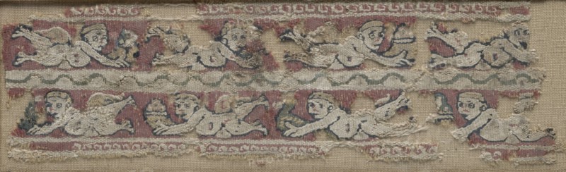 Fragment of a Sleeve Band with Floating Erotes, 600s - 700s. Egypt, 7th - 8th century. Tapestry; linen and wool; overall: 6.1 x 22.5 cm (2 3/8 x 8 7/8 in.).