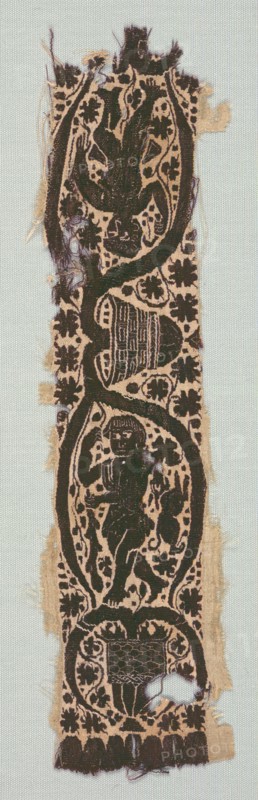 Rare Silk Tunic Fragment with Ornamental Sleeve Band, 400s-500s. Egypt, Byzantine period, 5th - 6th century. Plain weave: silk; tapestry weave with supplementary weft wrapping; undyed linen, dyed wool, silk; overall: 6.4 x 26.8 cm (2 1/2 x 10 9/16 in.)