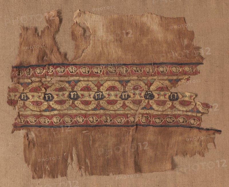 Fragment of a Tiraz-Style Textile, 1100s. Egypt, Fatimid period, 12th century. Tabby ground with inwoven tapestry ornament; linen and silk; overall: 20.7 x 26.1 cm (8 1/8 x 10 1/4 in.)