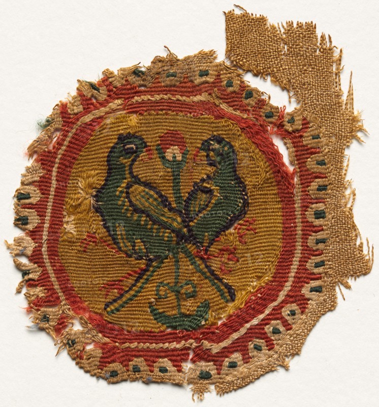 Segmentum from a Tunic, 600s - 700s. Egypt, Umayyad period (?), 7th - 8th century. Tabby weave, inwoven tapestry ornament; wool and linen; overall: 10.7 x 11.7 cm (4 3/16 x 4 5/8 in.).