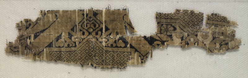 Textile Fragment with Portions of Eight-Pointed Star and Birds, 11th-12th century. Syria, Ayyubid period, 11th-12th century. Lampas weave, silk; overall: 4.7 x 18.5 cm (1 7/8 x 7 5/16 in.)