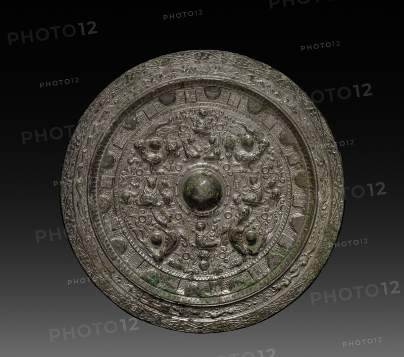 Mirror with Xiwangmu, c. 317-400. China, early Six Dynasties Period (317-581). Bronze; diameter: 18.5 cm (7 5/16 in.).