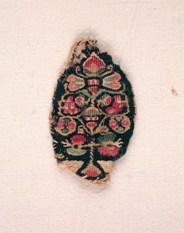 Pendant of a Clavus (?), 300s - 500s. Egypt, Byzantine period, 4th - 6th century. Tapestry weave: wool; overall: 5.5 x 3.3 cm (2 3/16 x 1 5/16 in.)