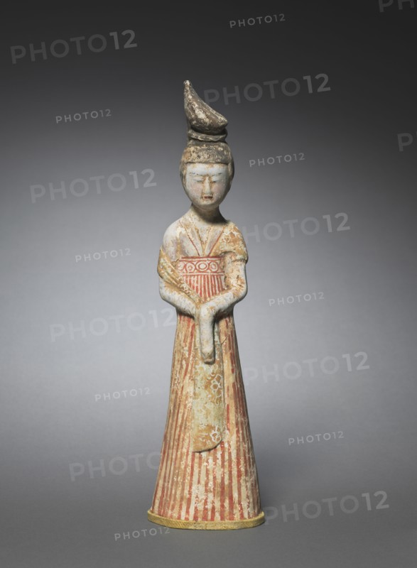 Court Lady with High Chignon, c. 700-750. North China, Tang dynasty (618-907). Earthenware with polychromy; overall: 31.6 cm (12 7/16 in.).